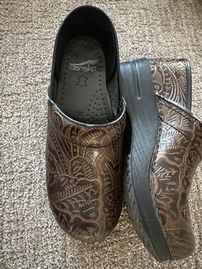 Dansko Women’s Brown Embossed Slip-On Clogs; size 38